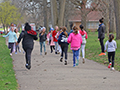  Franklin Elementary students run along a path